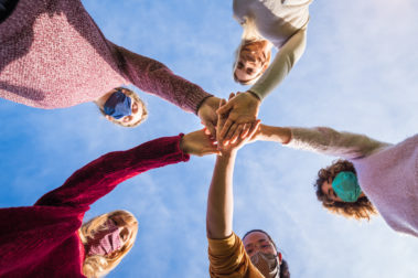Community of multiracial young people fighting Coronavirus - New normal lifestyle concept of friends with face mask outdoor.; Shutterstock ID 1848764374; purchase_order: Holger Schmidt; job: Kiki 4 / 2021 - Kst 2516; client: ; other: